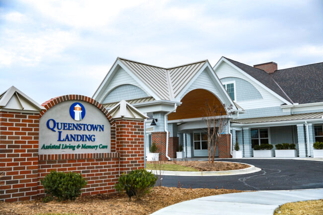 Porte Cochere Jan 2021 Queens Landing front entrance and monument sign